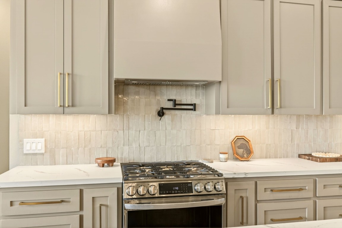 115 Country View Lane Schulenburg, TX 78956 - Photo 15 of 44 a kitchen with stainless steel appliances granite countertop a sink stove and cabinets