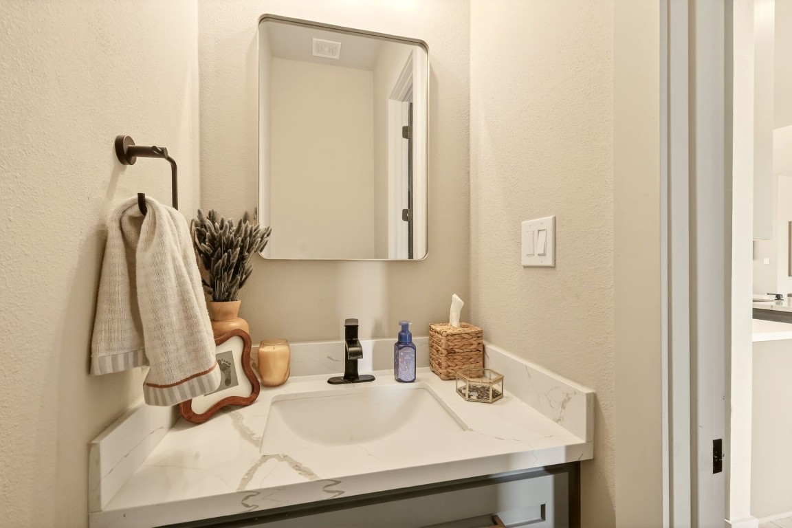 115 Country View Lane Schulenburg, TX 78956 - Photo 24 of 44 a bathroom with a sink and a mirror
