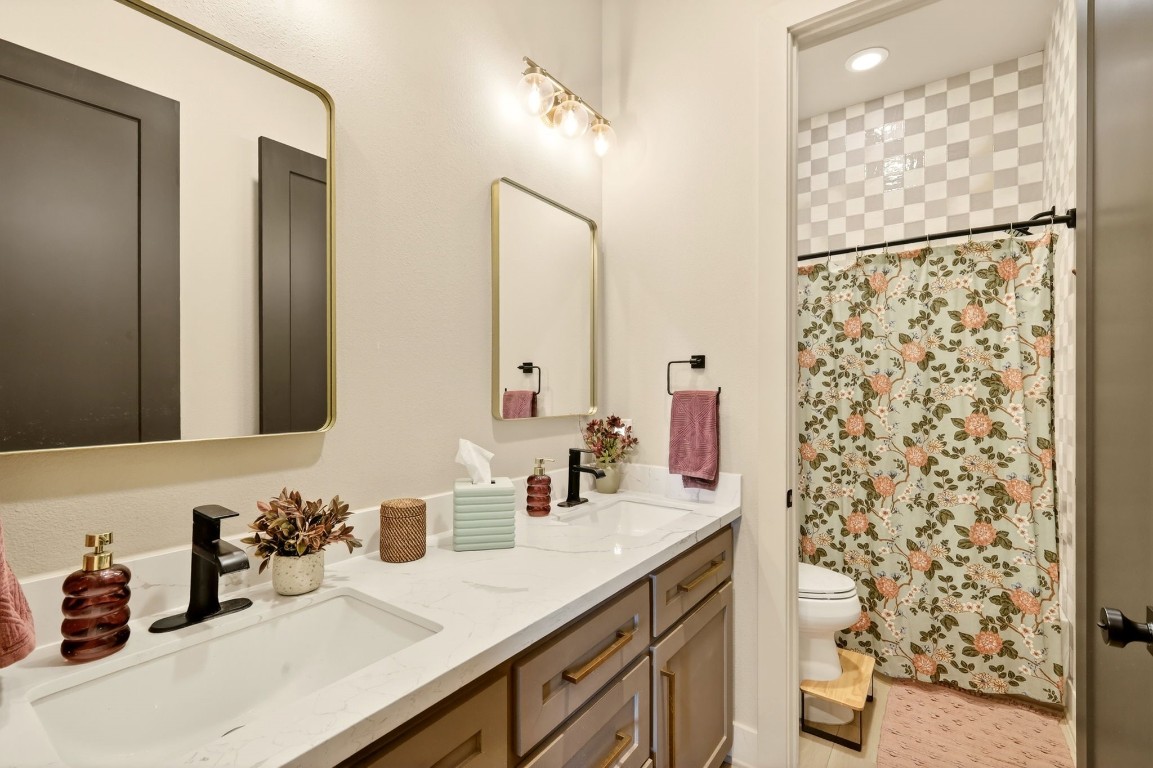 115 Country View Lane Schulenburg, TX 78956 - Photo 34 of 44 a bathroom with a sink and a mirror