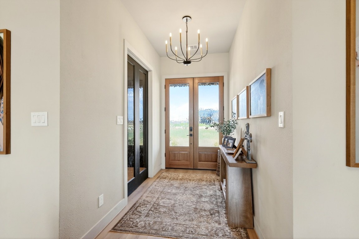 115 Country View Lane Schulenburg, TX 78956 - Photo 6 of 44 a view of a hallway to a livingroom with furniture