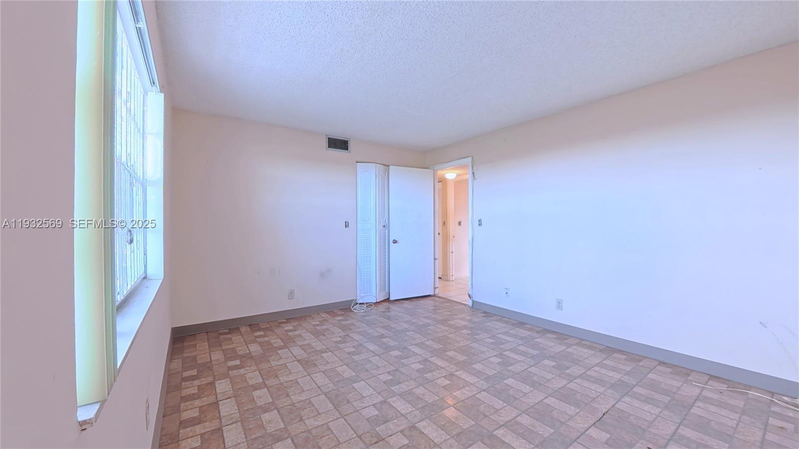 111 Southeast 3rd Avenue, Unit 502 Dania Beach, FL 33004 - Photo 11 of 14 a view of an empty room