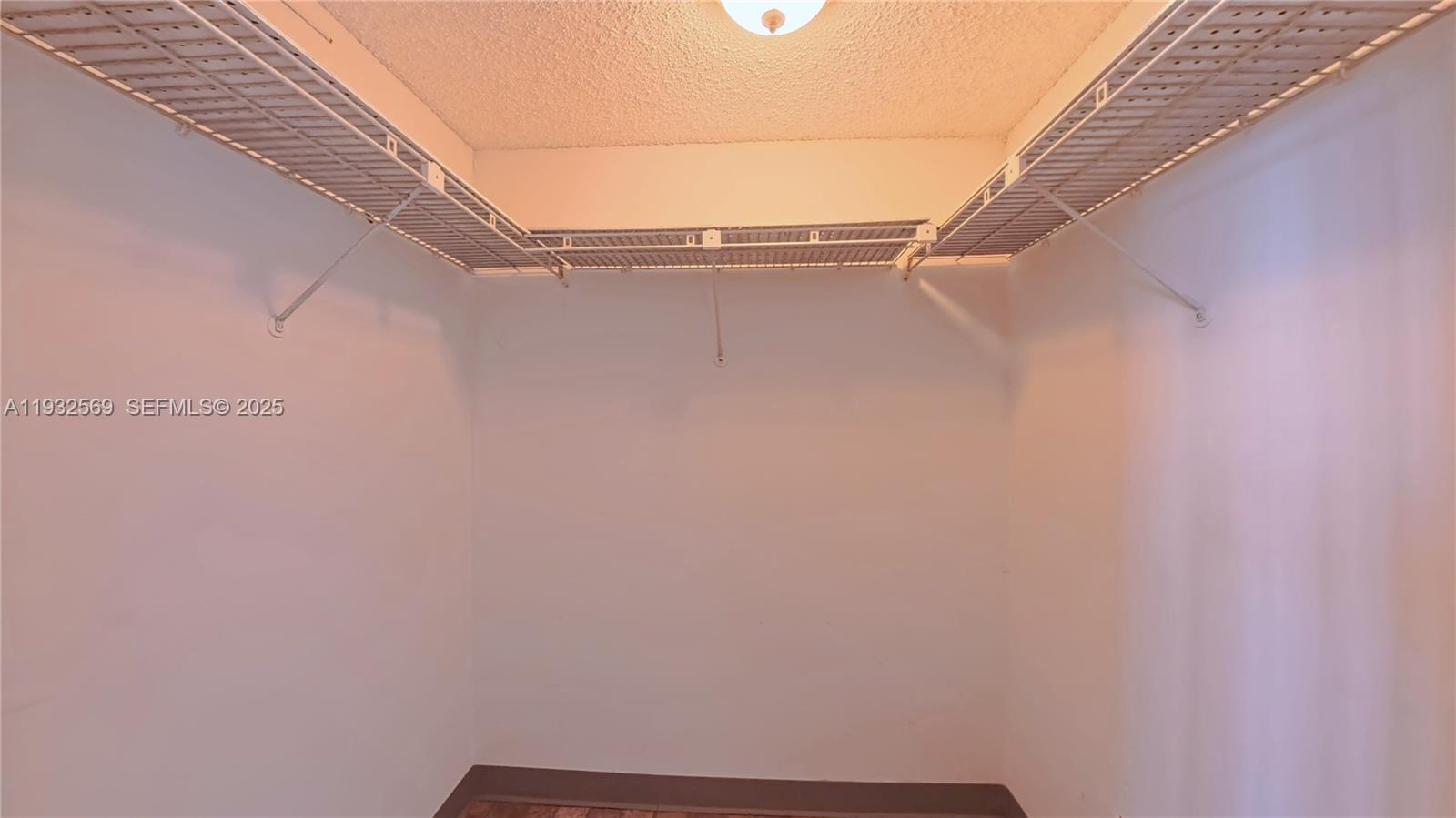 111 Southeast 3rd Avenue, Unit 502 Dania Beach, FL 33004 - Photo 12 of 14 a view of small space with empty racks