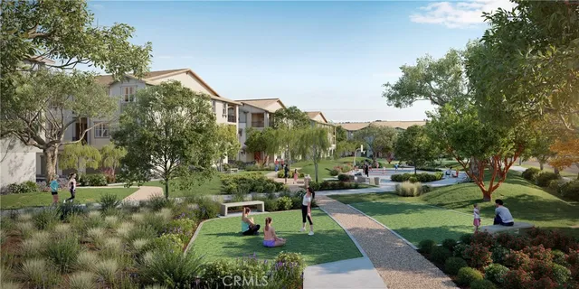 a view of a garden with sitting area