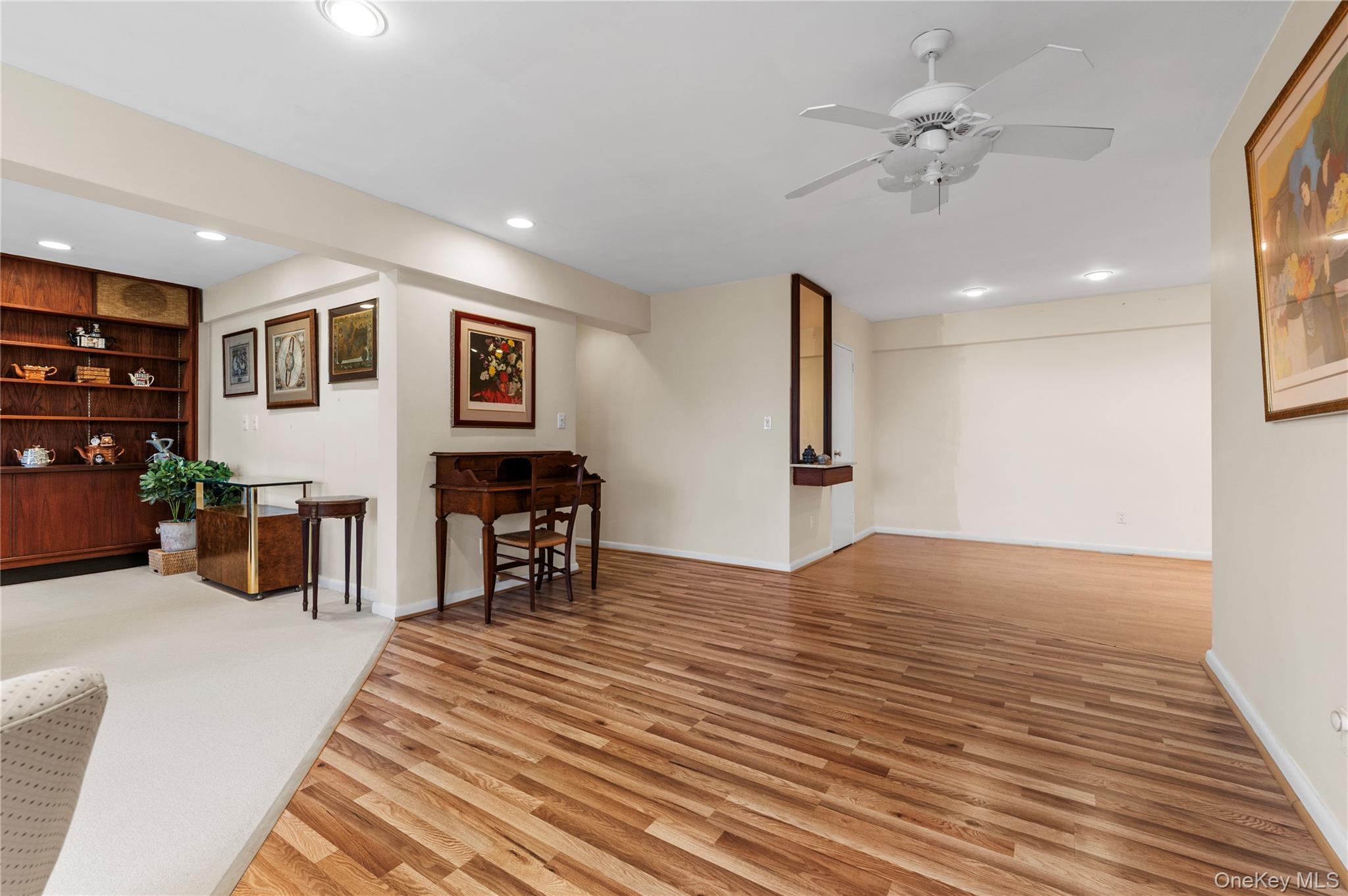 25 Chapel Place, Unit 2L Great Neck, NY 11021 - Photo 11 of 25 a view of a livingroom with furniture and workspace