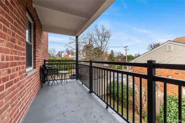 a view of balcony with a street