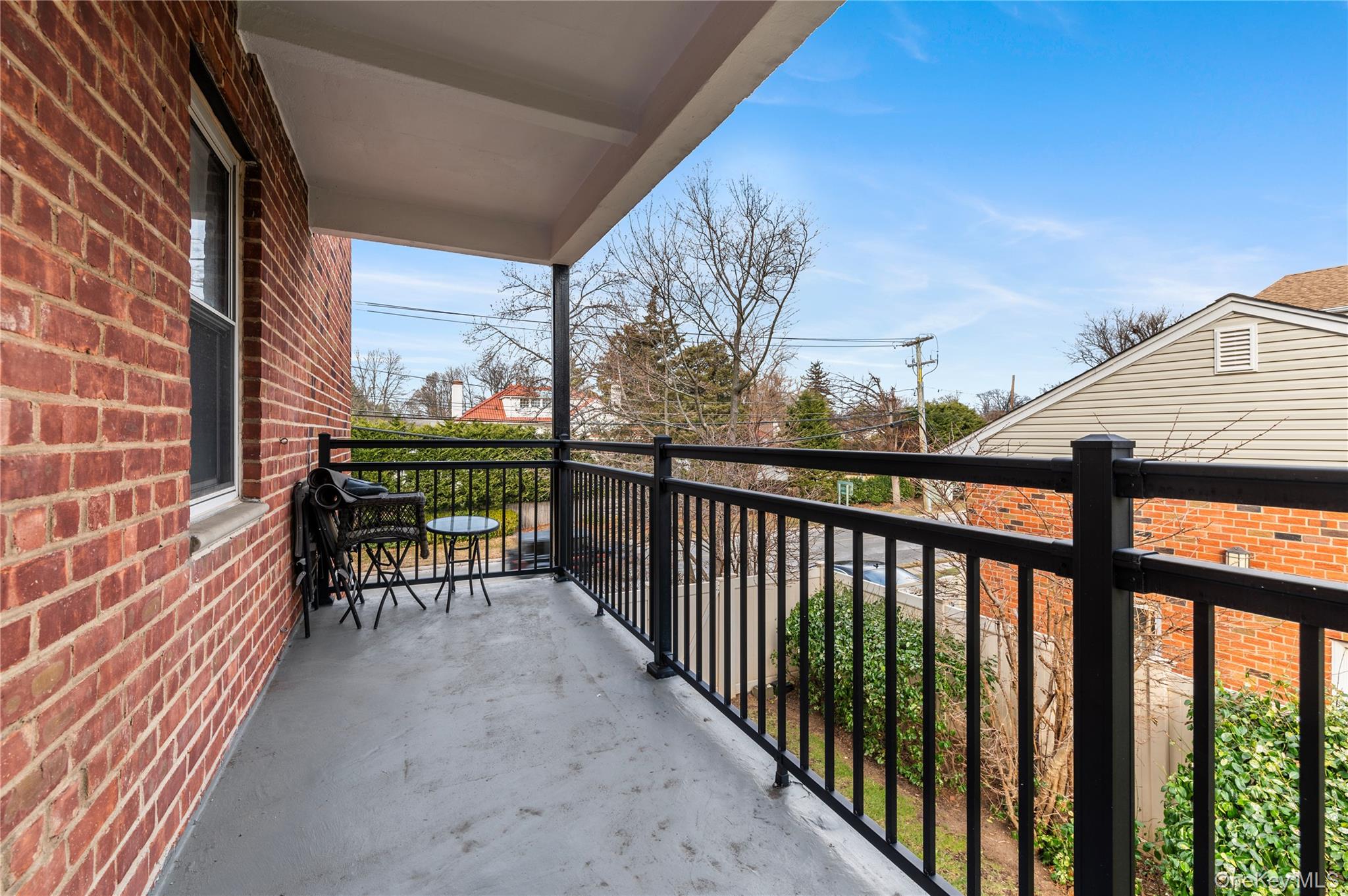 25 Chapel Place, Unit 2L Great Neck, NY 11021 - Photo 22 of 25 a view of two chairs in the balcony
