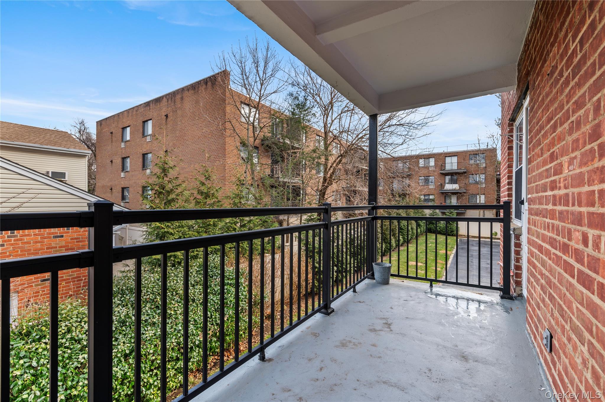 25 Chapel Place, Unit 2L Great Neck, NY 11021 - Photo 23 of 25 a view of balcony with a street