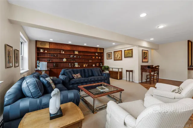a view of a livingroom with furniture and workspace