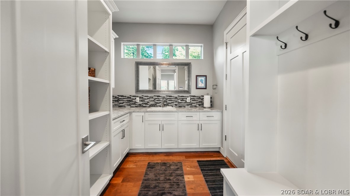 777 Malibu Road Osage Beach, MO 65065 - Photo 38 of 100 Butlers pantry that doubles as an entry from the g
