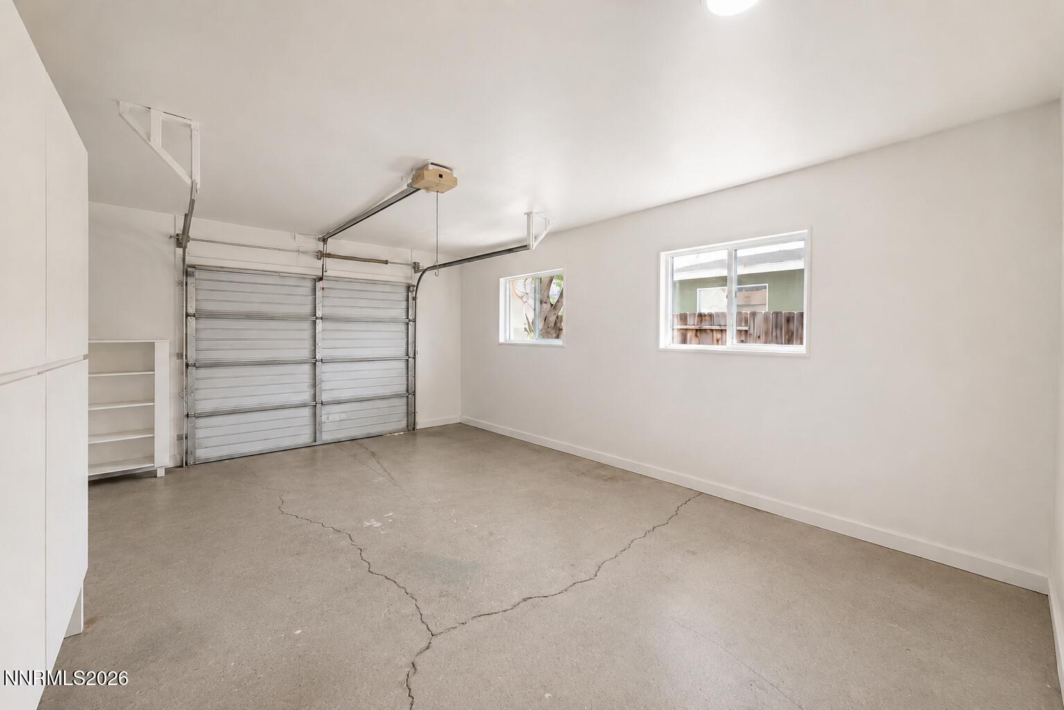 742 Ruth Street Carson City, NV 89701 - Photo 22 of 25 a view of room with stairs and a window