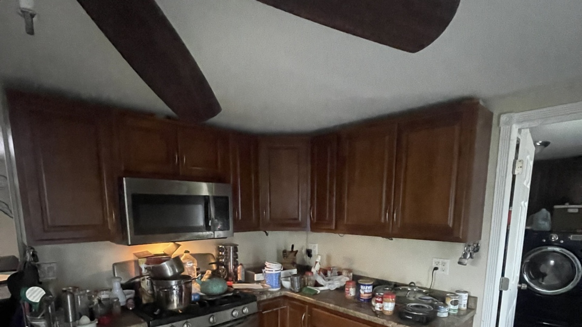 19227 Jacquie Avenue Romeoville, IL 60446 - Photo 6 of 17 a kitchen with a refrigerator stove and microwave