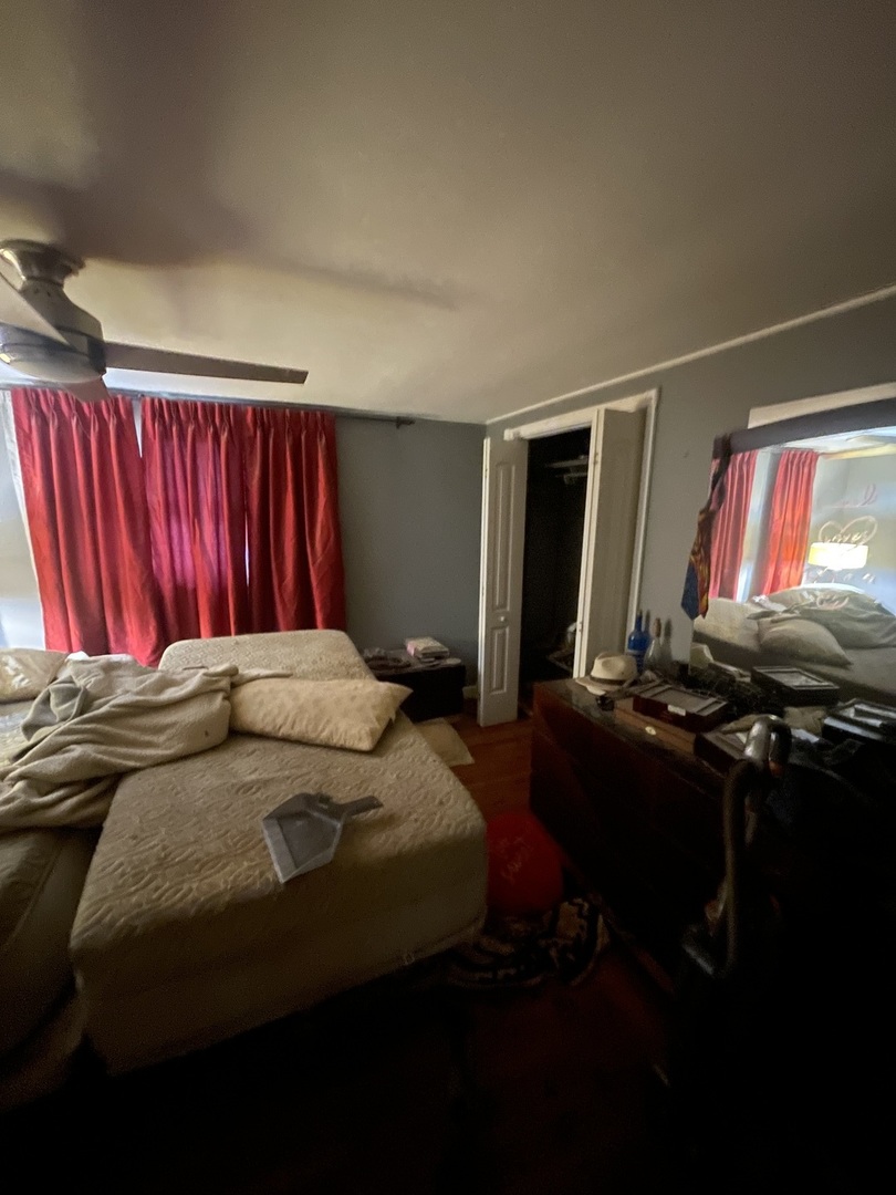 19227 Jacquie Avenue Romeoville, IL 60446 - Photo 8 of 17 a bedroom with a bed next to a window