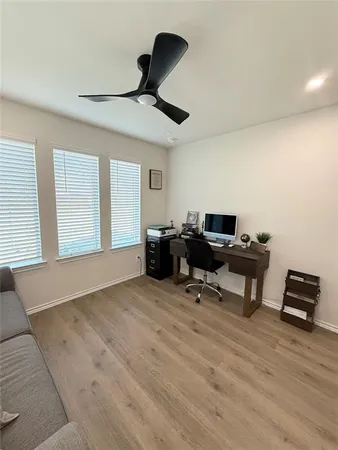 a large room with lots of wooden furniture