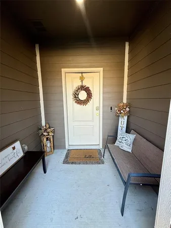 a room with furniture and a window