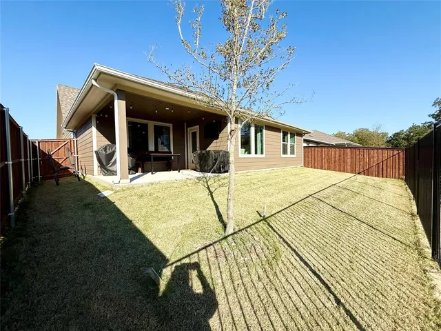a view of a house with a large window