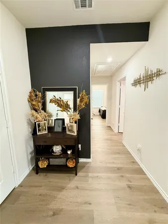 a view of a livingroom with furniture and a fireplace