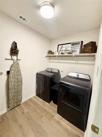 a kitchen with a stove and a cabinet