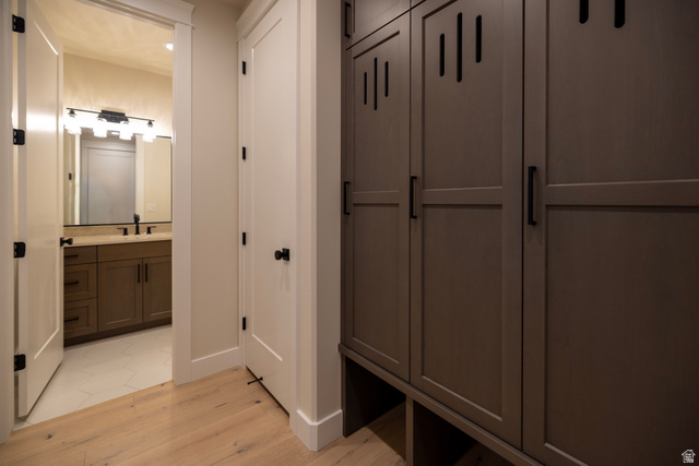 904 South 1900 West Layton, UT 84041 - Photo 10 of 19 Mudroom with light wood-style tile flooring and half bathroom