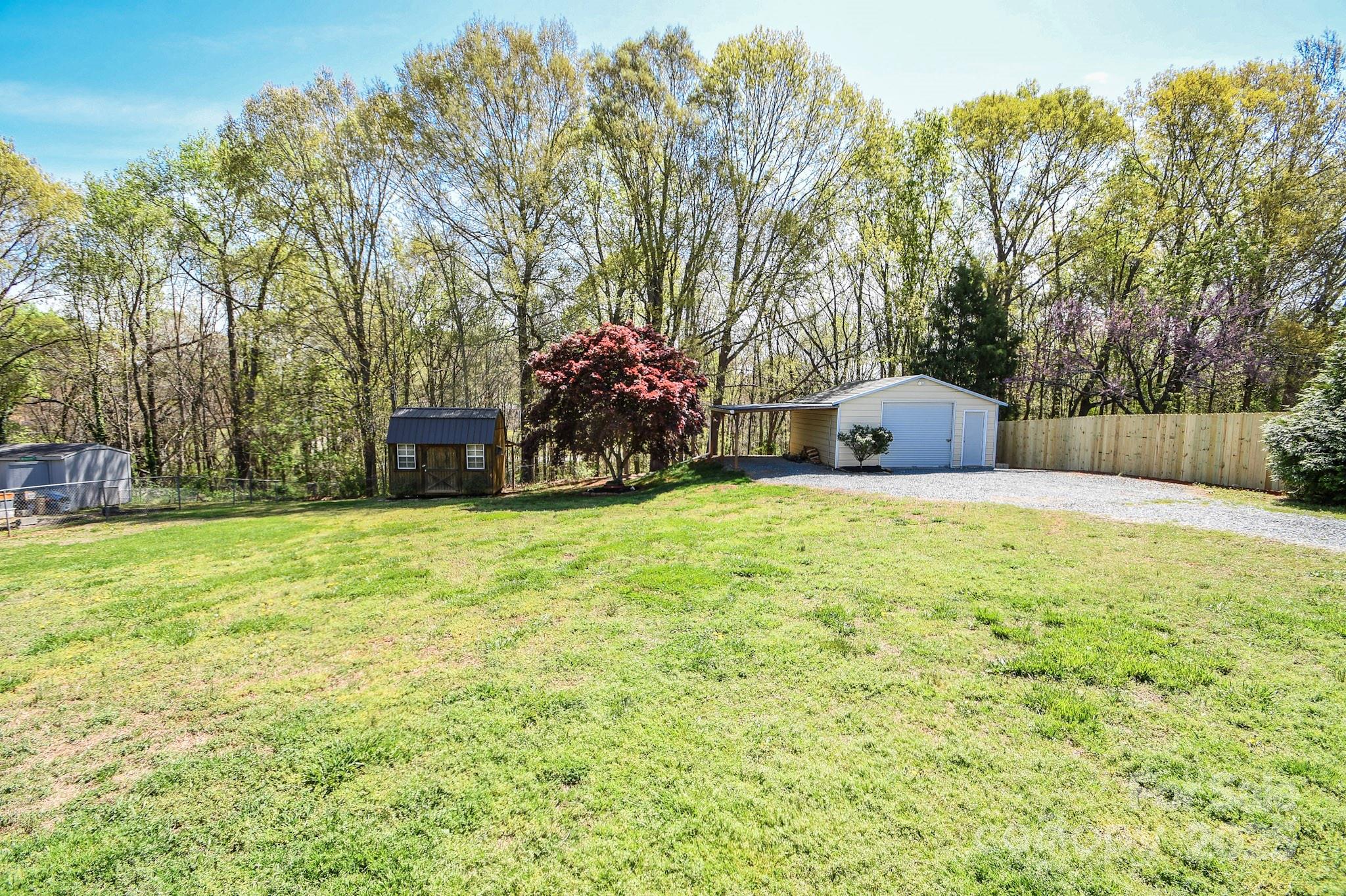 5112 Unionville Road Monroe, NC 28110 - Photo 12 of 31 a front view of a house with garden