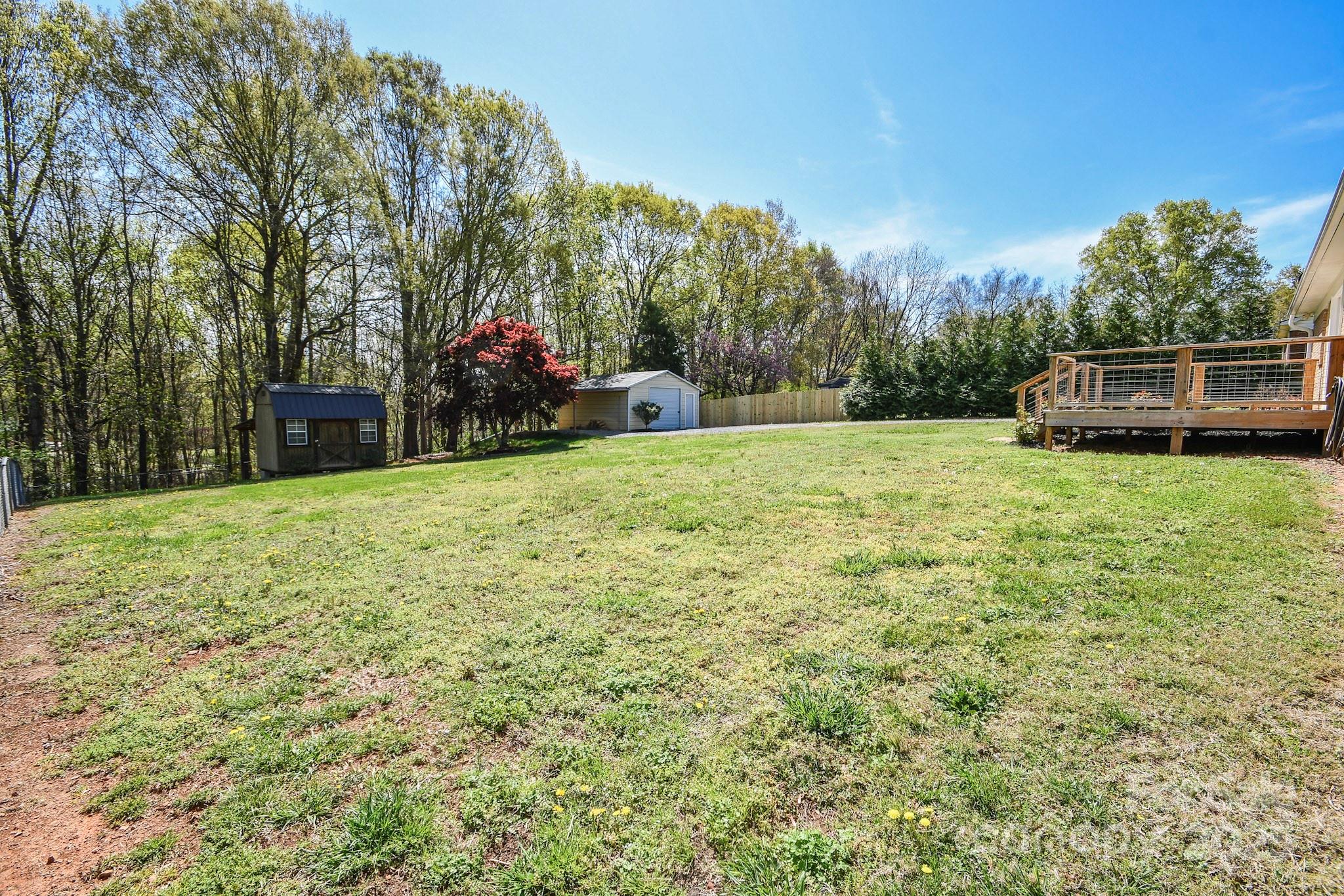 5112 Unionville Road Monroe, NC 28110 - Photo 13 of 31 a view of a yard with large trees