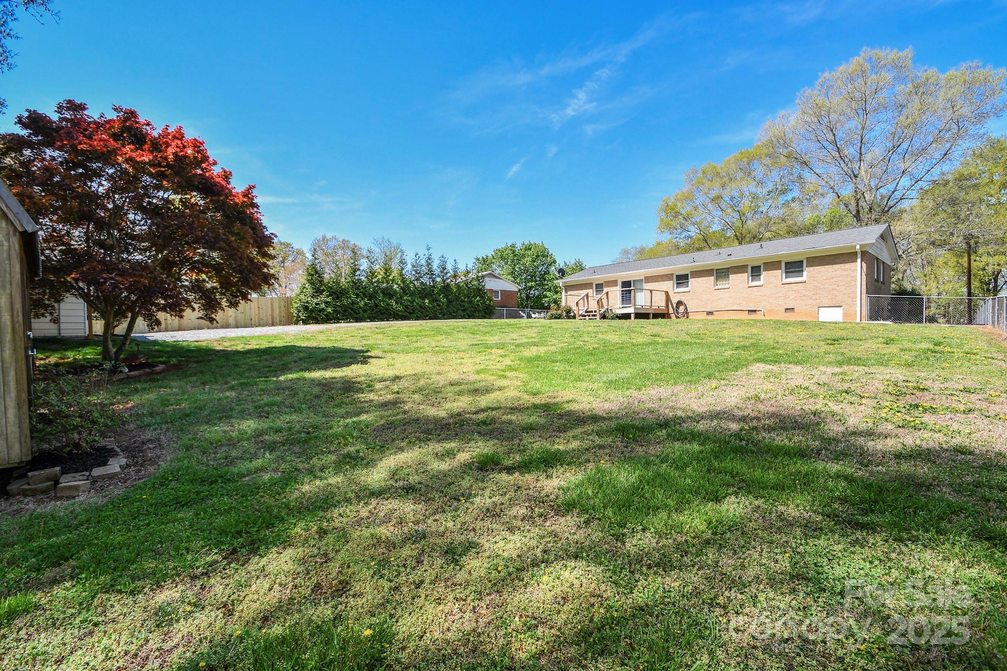 5112 Unionville Road Monroe, NC 28110 - Photo 14 of 31 a view of a big yard with a house in the background