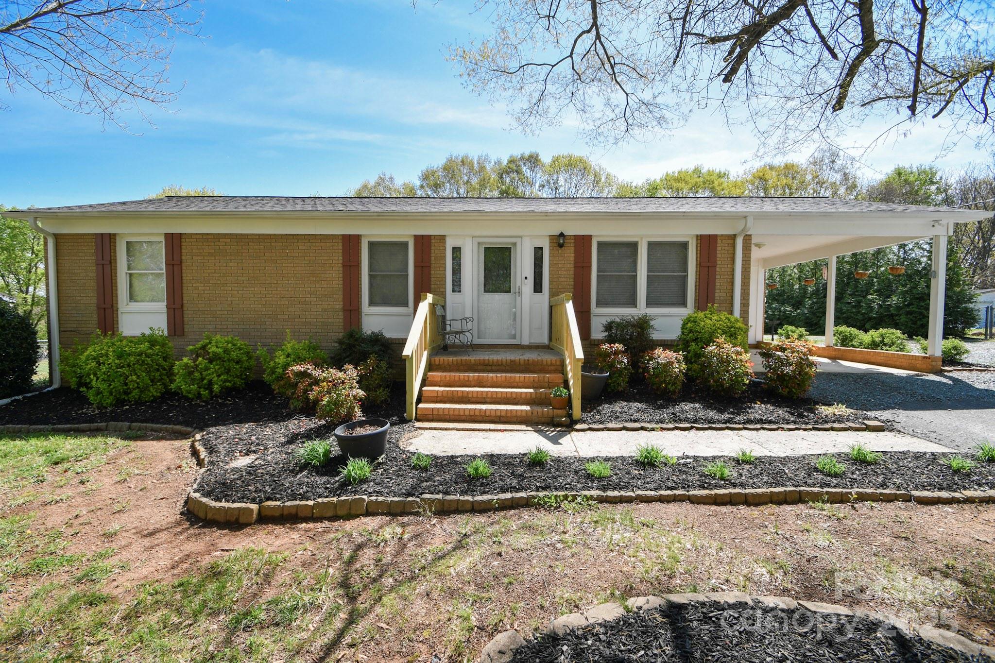 5112 Unionville Road Monroe, NC 28110 - Photo 2 of 31 front view of a house with a porch