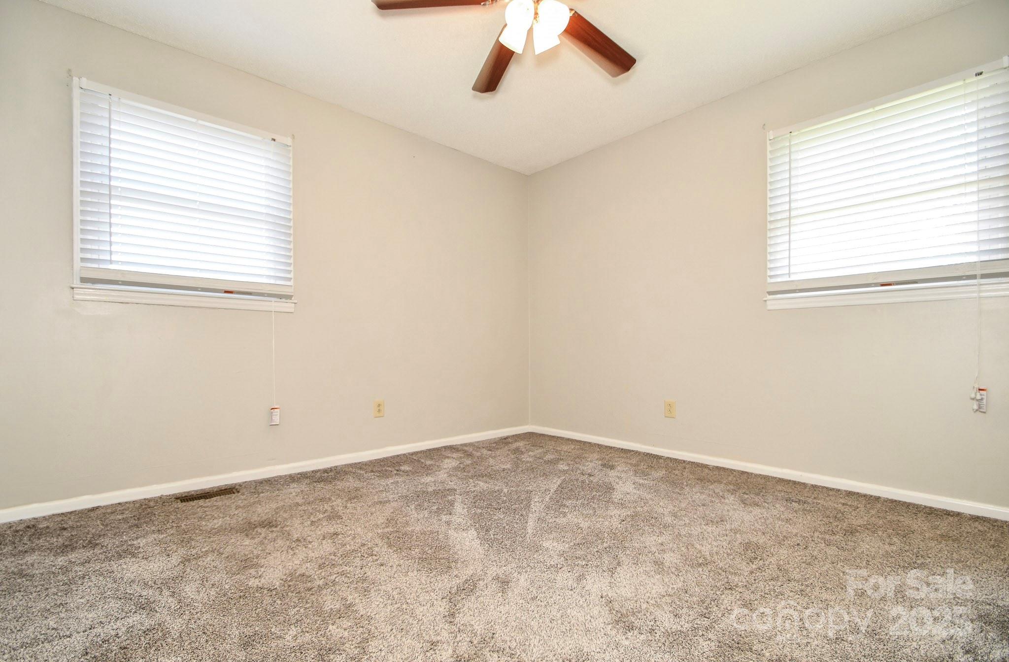 5112 Unionville Road Monroe, NC 28110 - Photo 26 of 31 an empty room with a window