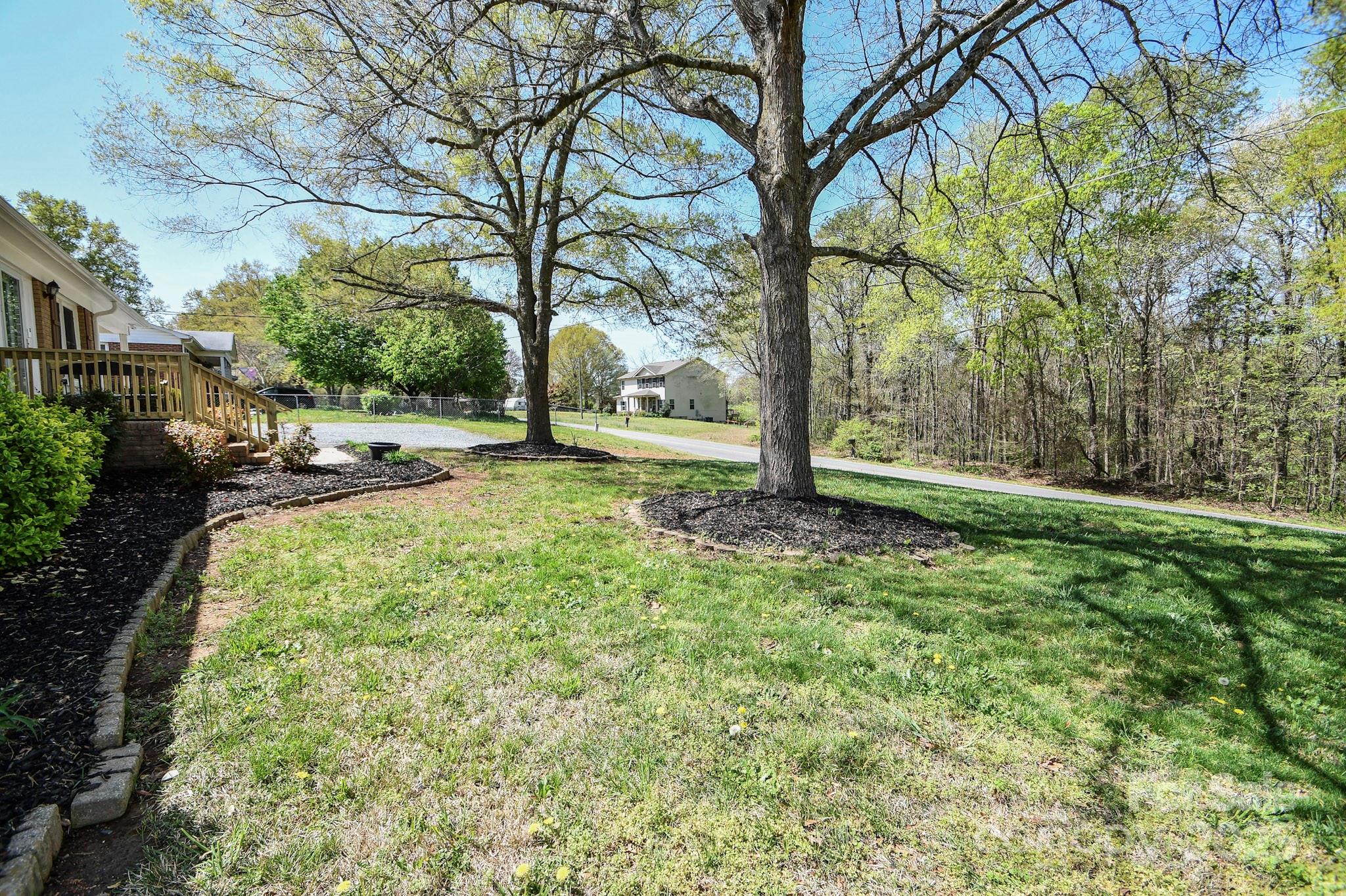 5112 Unionville Road Monroe, NC 28110 - Photo 29 of 31 a backyard of a house with lots of green space