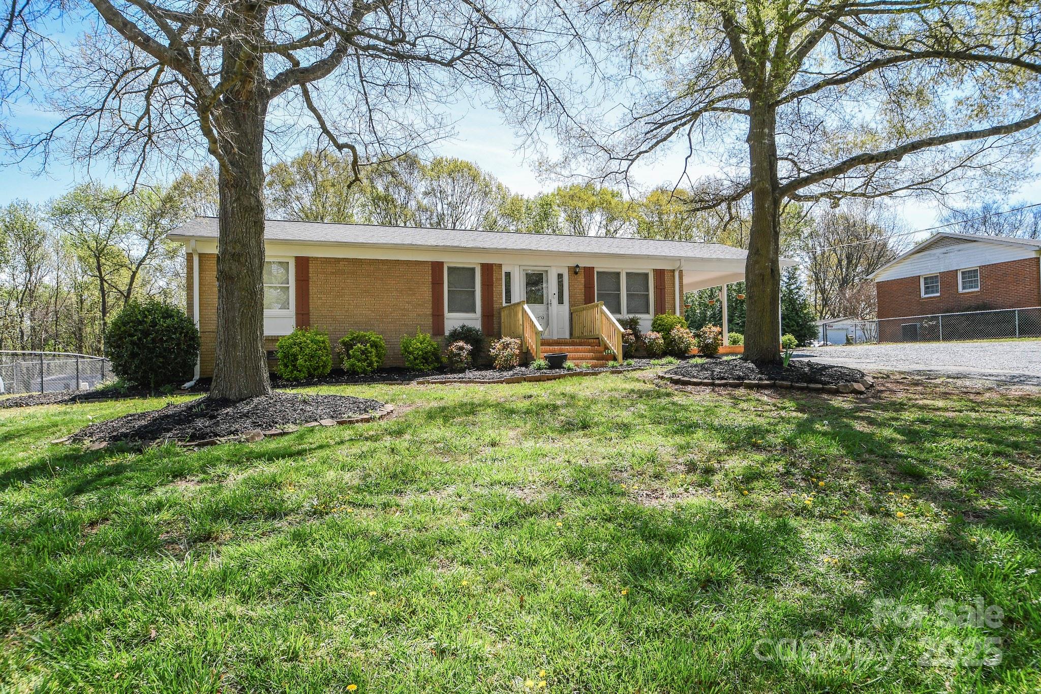 5112 Unionville Road Monroe, NC 28110 - Photo 3 of 31 a backyard of a house with seating space