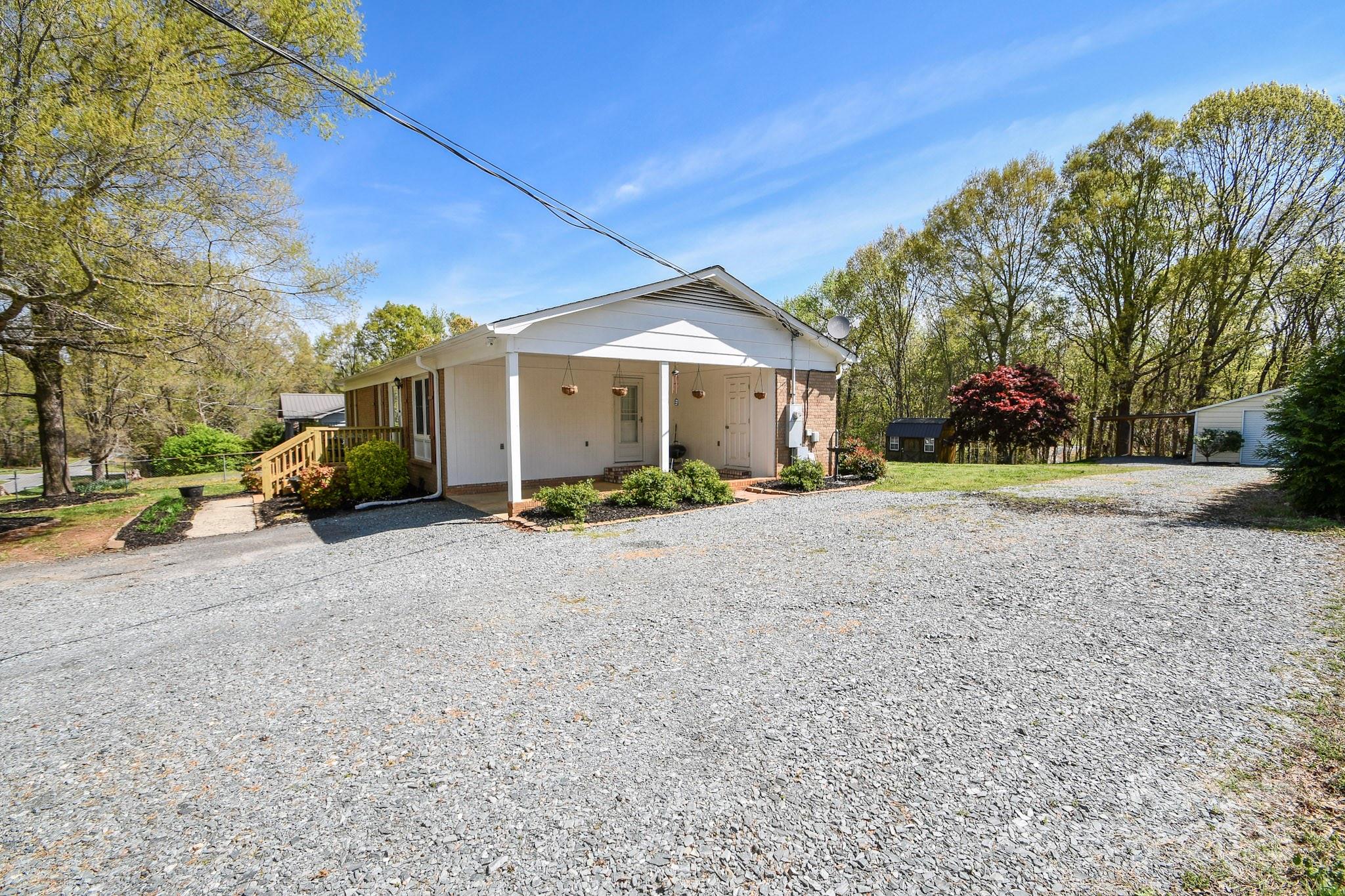 5112 Unionville Road Monroe, NC 28110 - Photo 5 of 31 a view of a street with houses