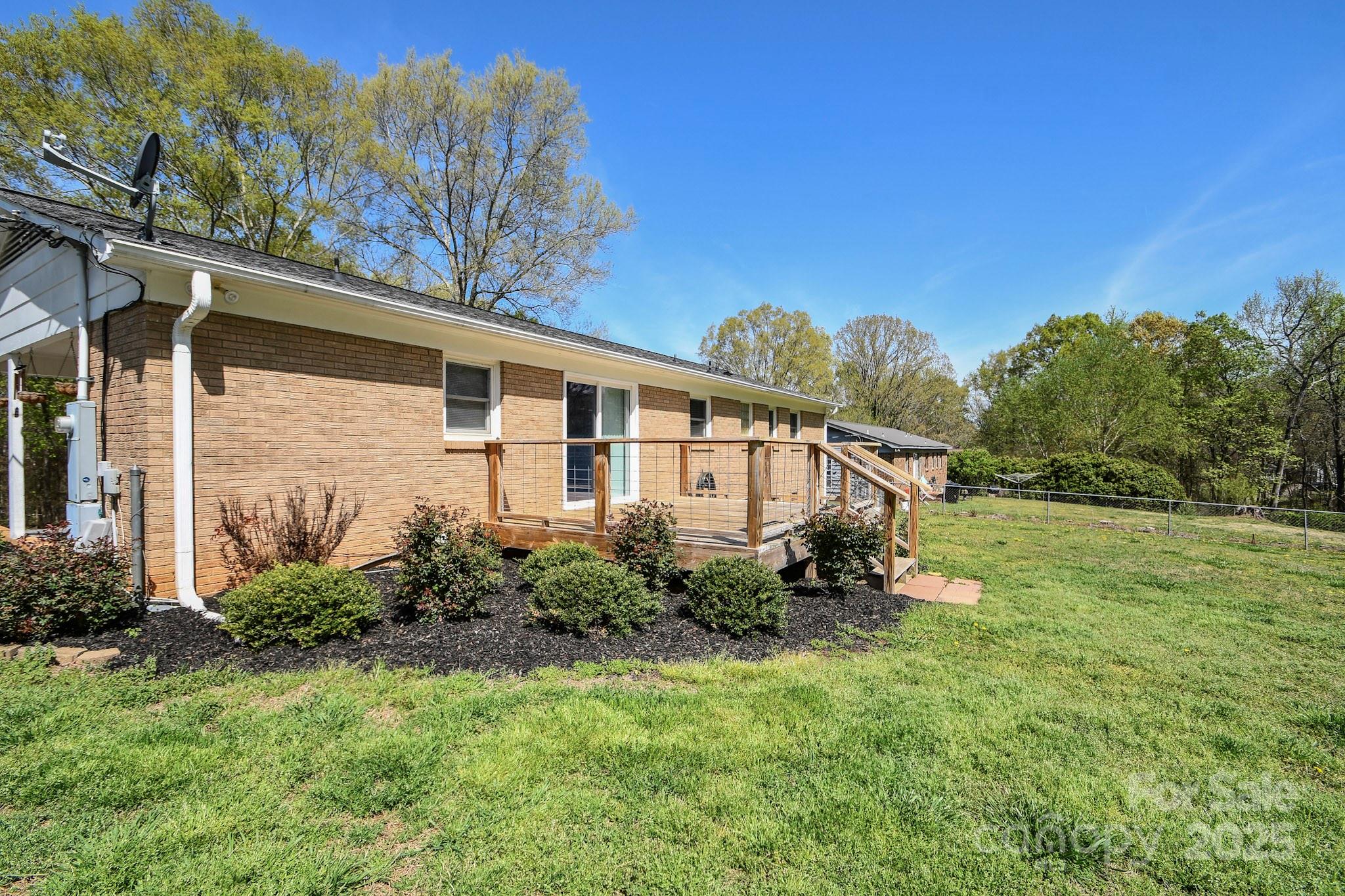 5112 Unionville Road Monroe, NC 28110 - Photo 8 of 31 a house view with a garden space