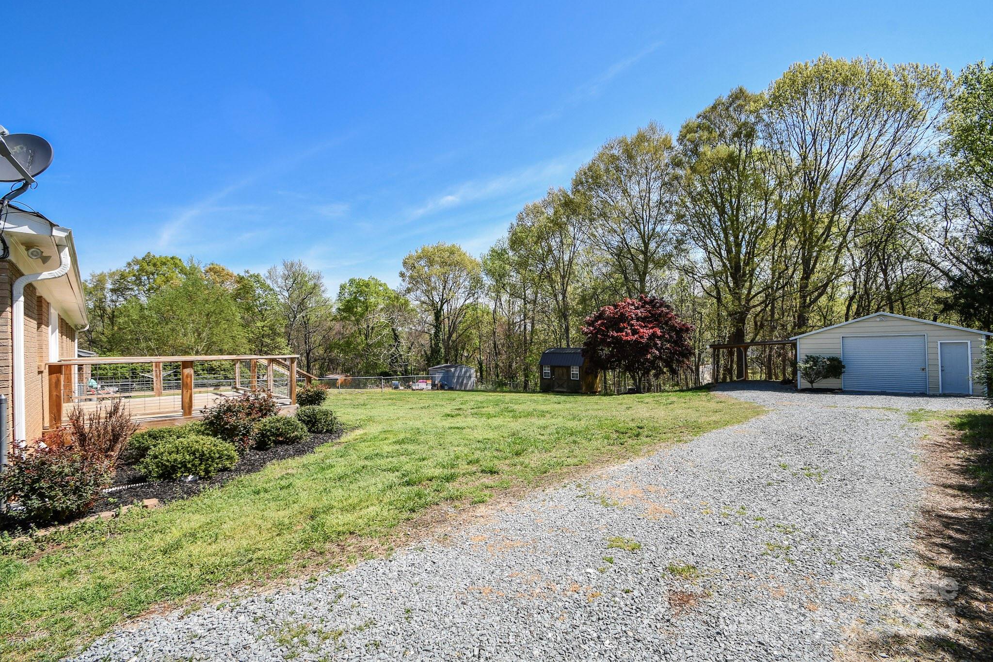 5112 Unionville Road Monroe, NC 28110 - Photo 9 of 31 a front view of a house with garden