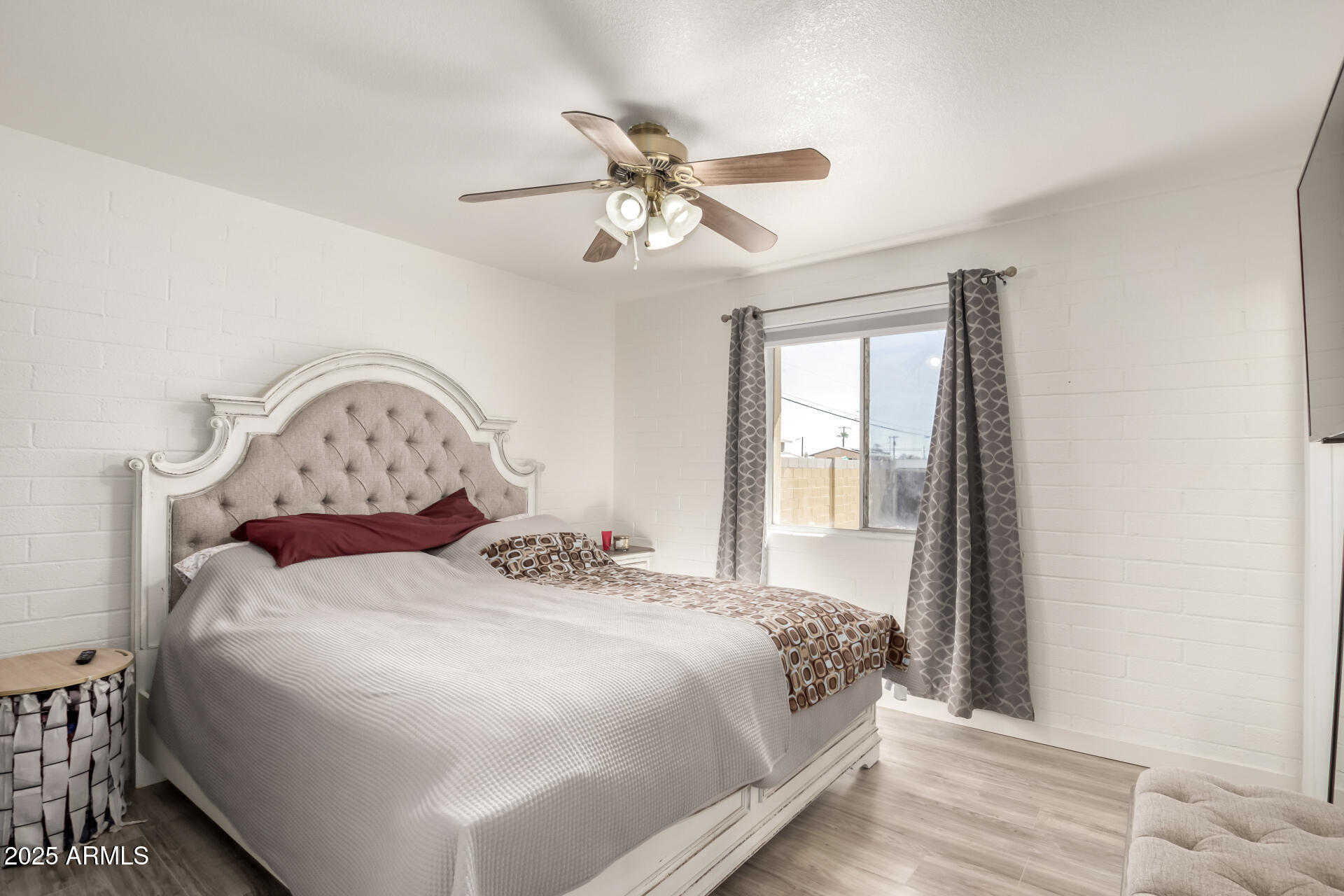 433 East Taylor Street Tempe, AZ 85288 - Photo 13 of 32 a bedroom with a bed and a window
