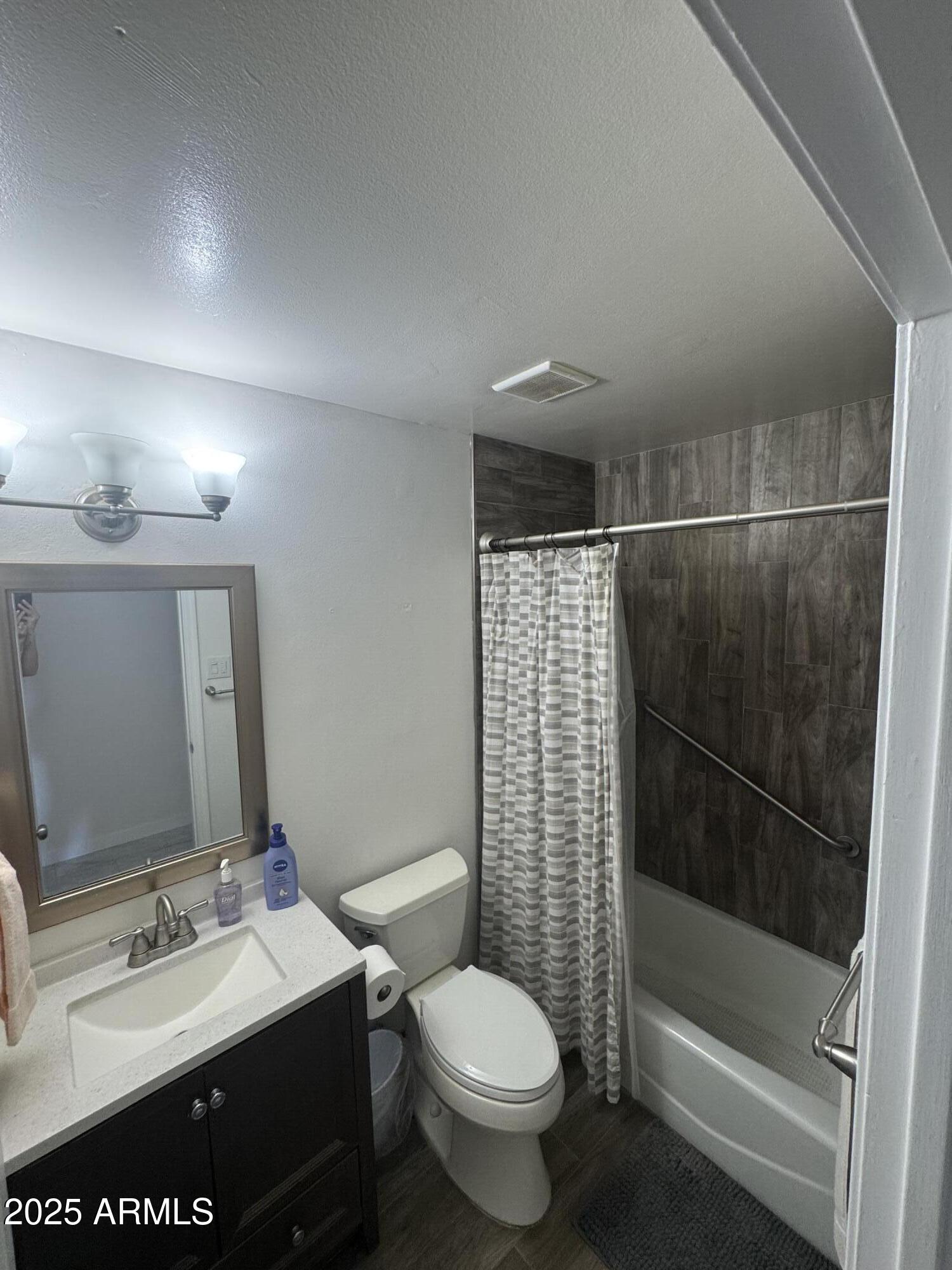 433 East Taylor Street Tempe, AZ 85288 - Photo 23 of 32 a bathroom with a sink toilet and shower