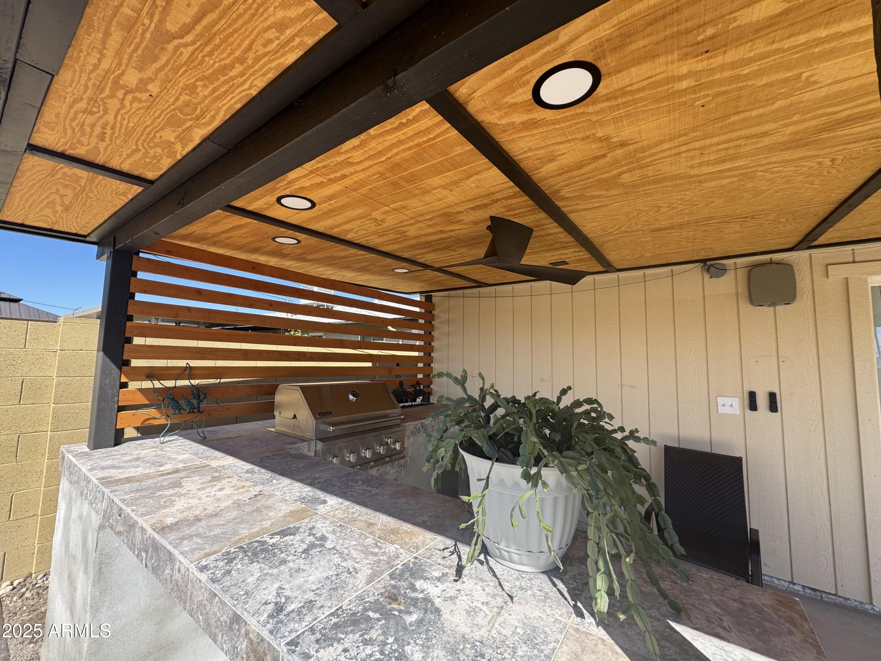 433 East Taylor Street Tempe, AZ 85288 - Photo 28 of 32 a backyard of a house with table and chairs