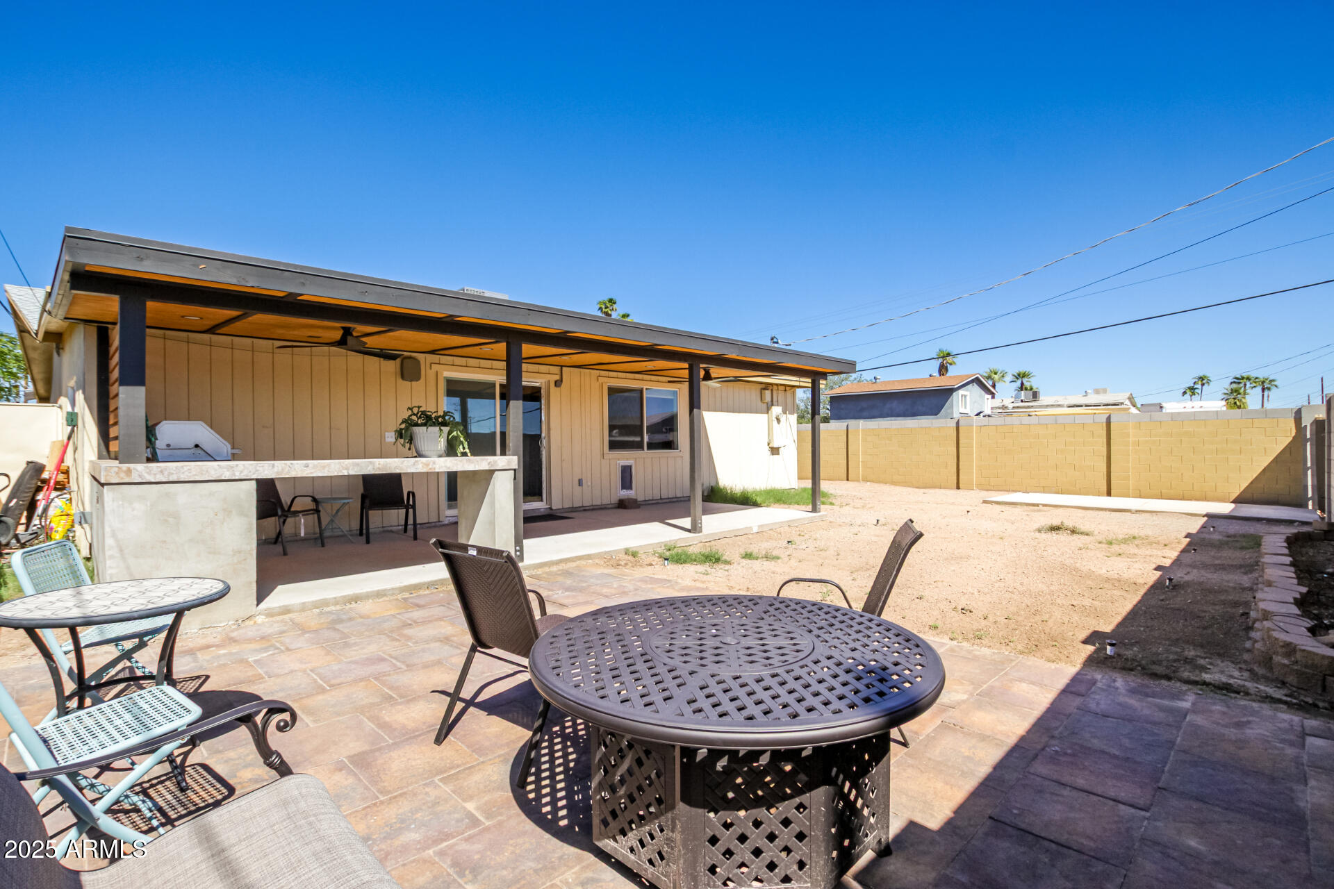 433 East Taylor Street Tempe, AZ 85288 - Photo 30 of 32 a view of a swimming pool with a patio