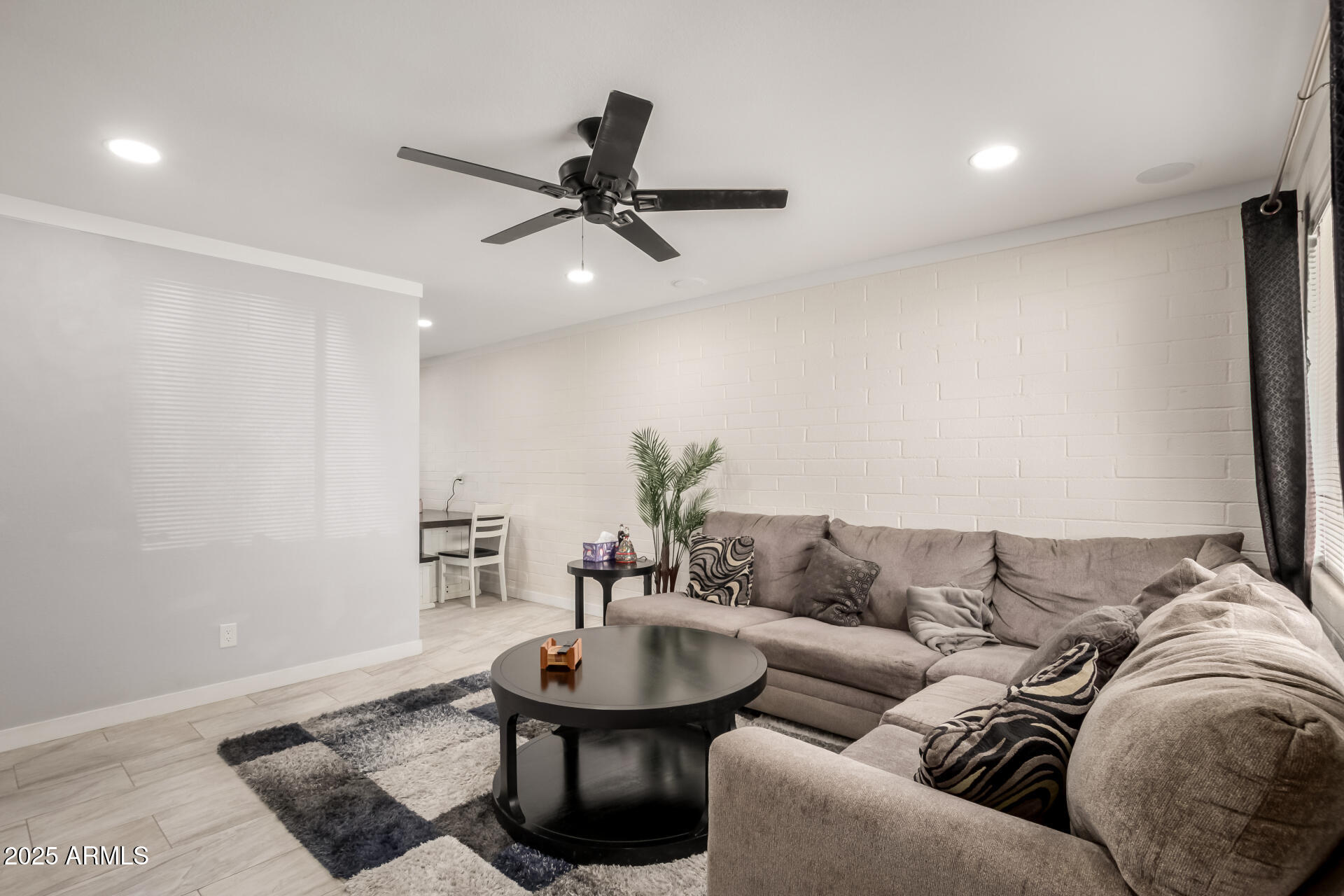 433 East Taylor Street Tempe, AZ 85288 - Photo 3 of 32 a living room with furniture and a wooden floor