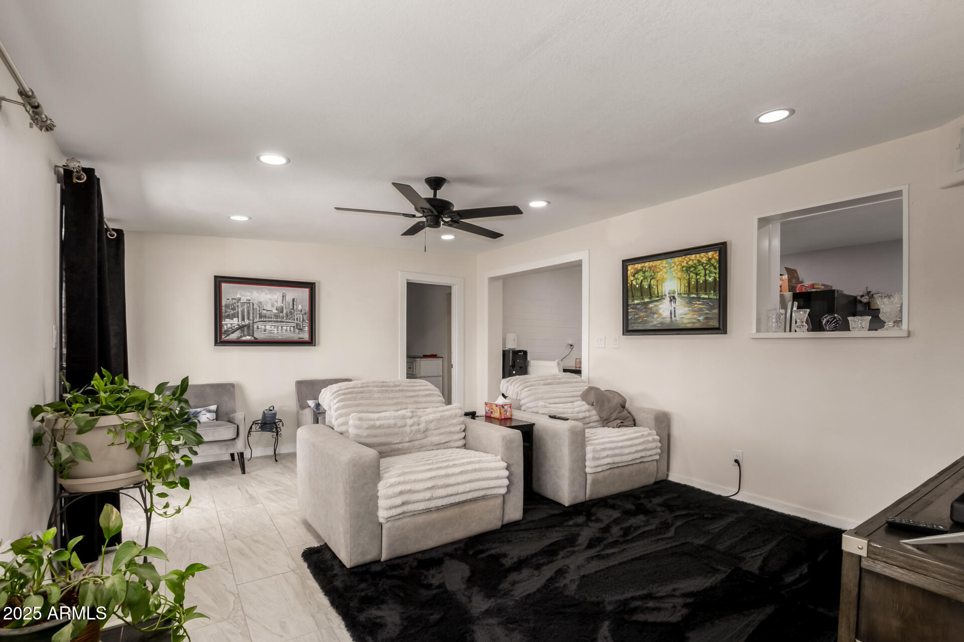 433 East Taylor Street Tempe, AZ 85288 - Photo 6 of 32 a living room with furniture and a potted plant