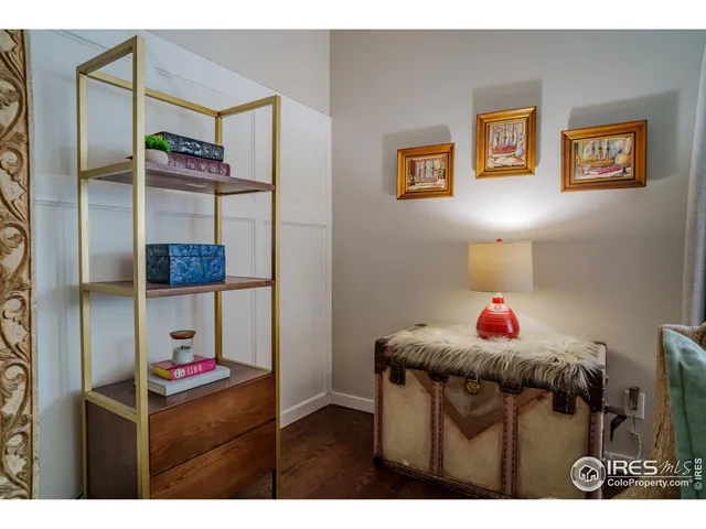 a bedroom with a bed and cabinets