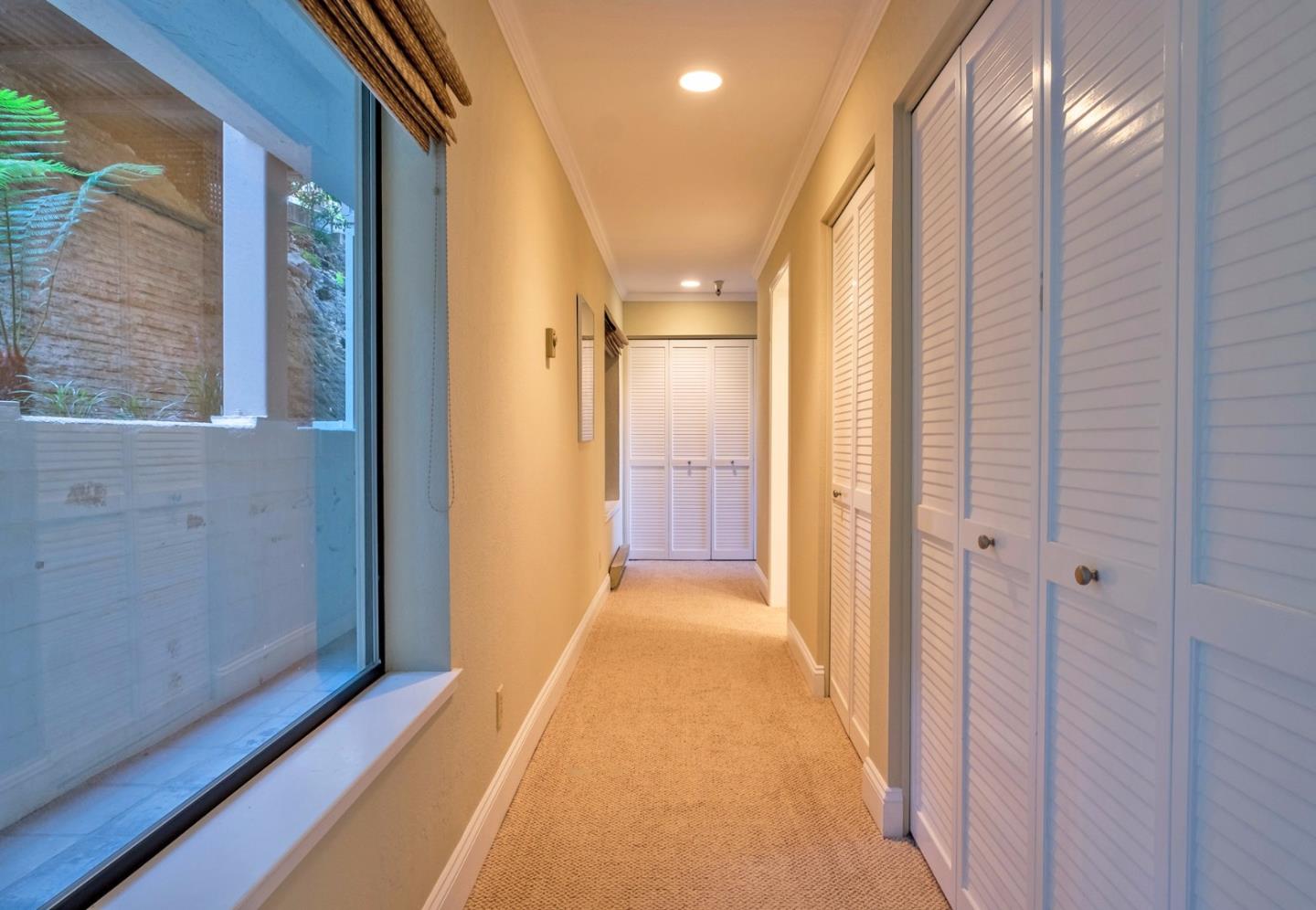 37 Shepherds Knoll Road Monterey, CA 93940 - Photo 13 of 20 a view of a hallway with wooden floor and staircase