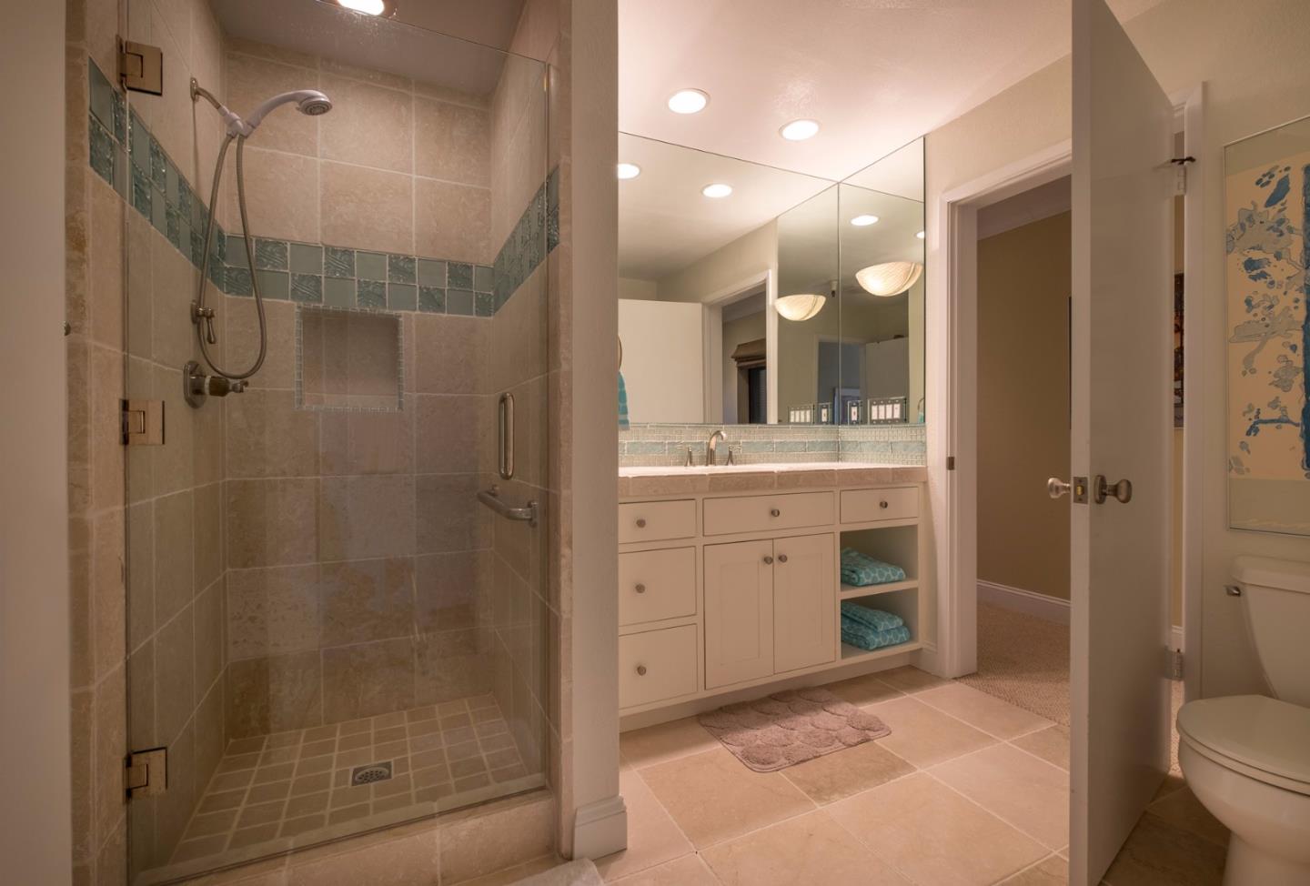 37 Shepherds Knoll Road Monterey, CA 93940 - Photo 15 of 20 a bathroom with a shower sink vanity mirror and toilet