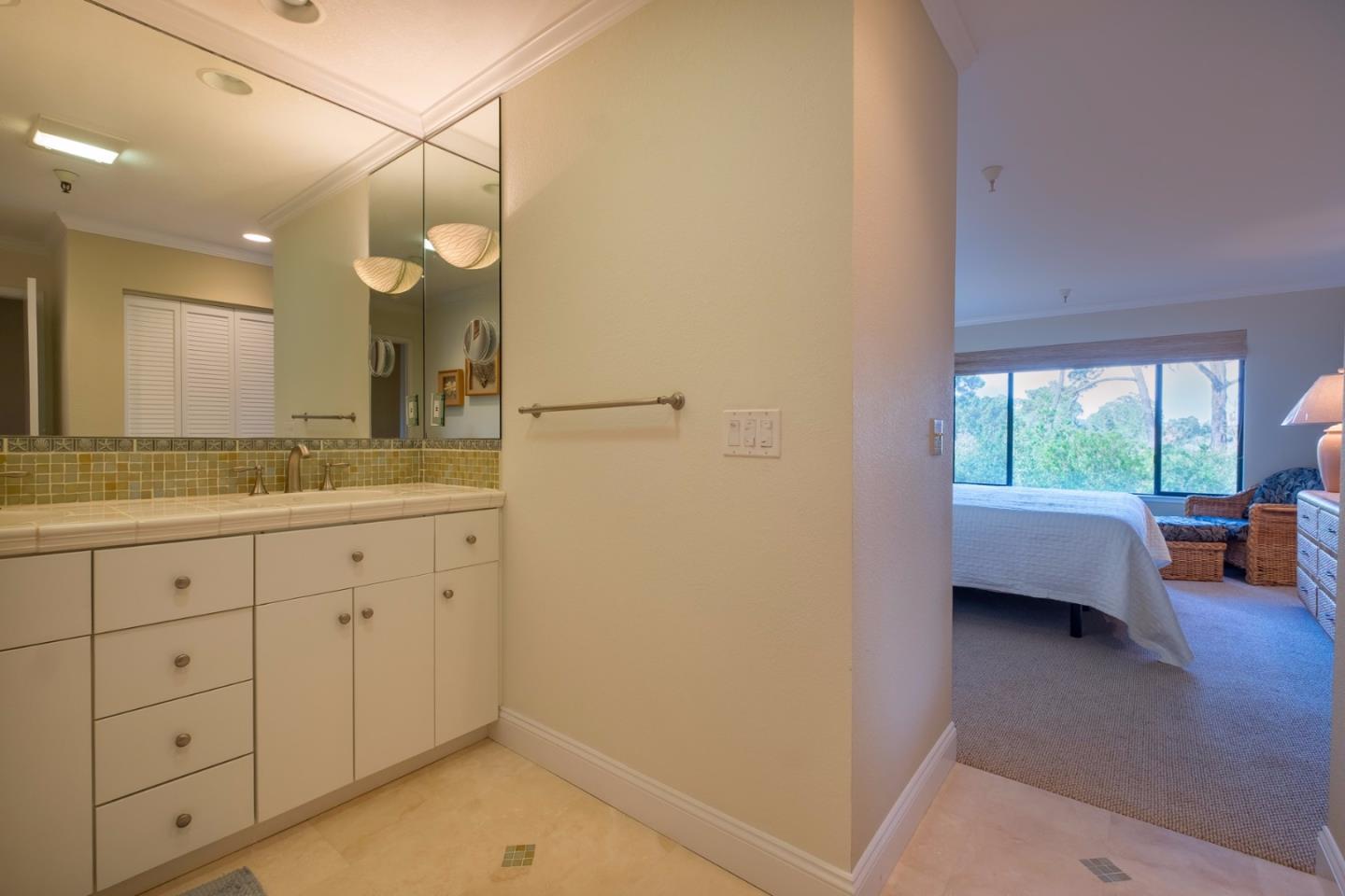 37 Shepherds Knoll Road Monterey, CA 93940 - Photo 17 of 20 a bathroom with a granite countertop sink mirror and window