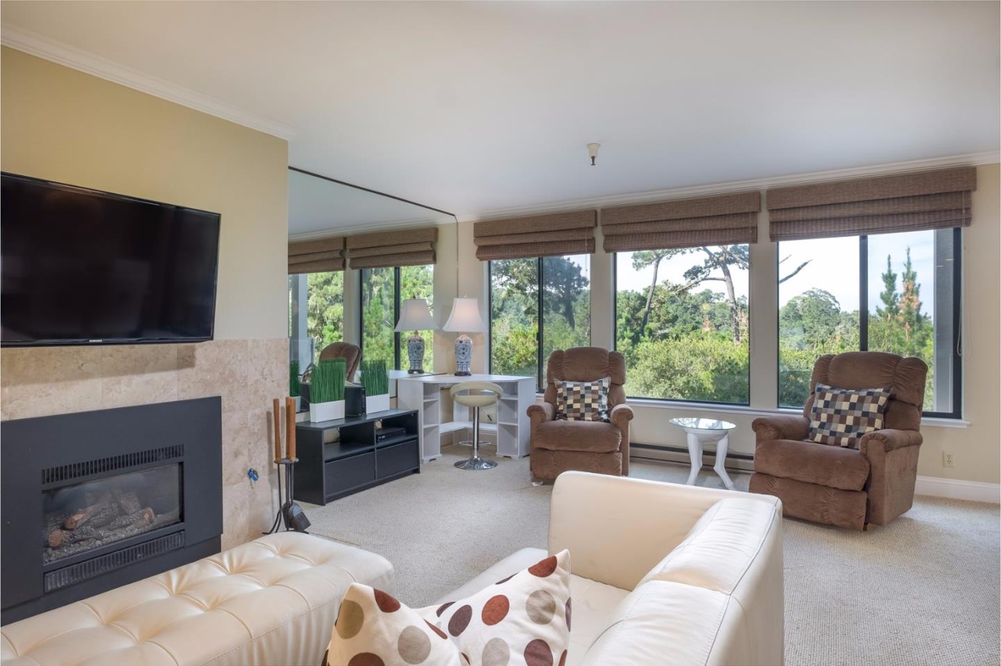 37 Shepherds Knoll Road Monterey, CA 93940 - Photo 3 of 20 a living room with furniture a flat screen tv and a fireplace