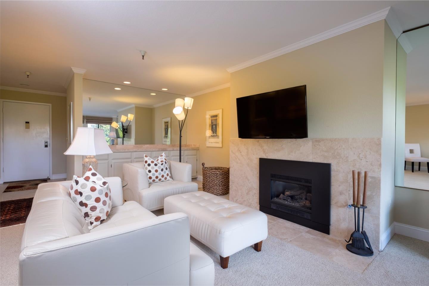 37 Shepherds Knoll Road Monterey, CA 93940 - Photo 5 of 20 a living room with furniture a fireplace and a flat screen tv