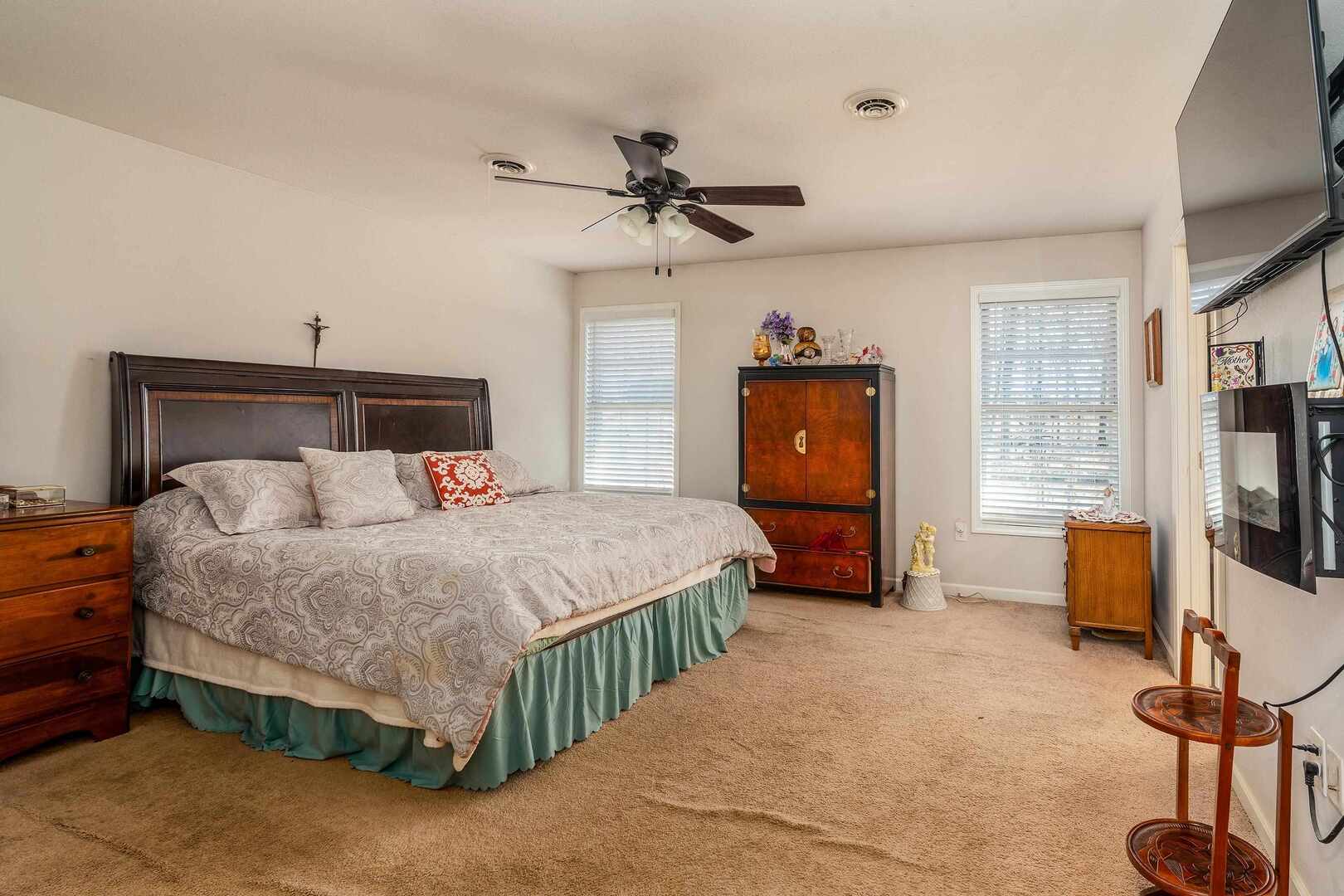 11114 Zachary Drive Marion, IL 62959 - Photo 13 of 34 a bedroom with a bed a flat screen tv and dresser