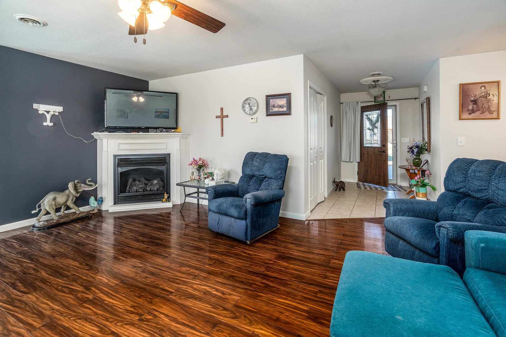 11114 Zachary Drive Marion, IL 62959 - Photo 6 of 34 a living room with furniture flat screen tv and a fireplace