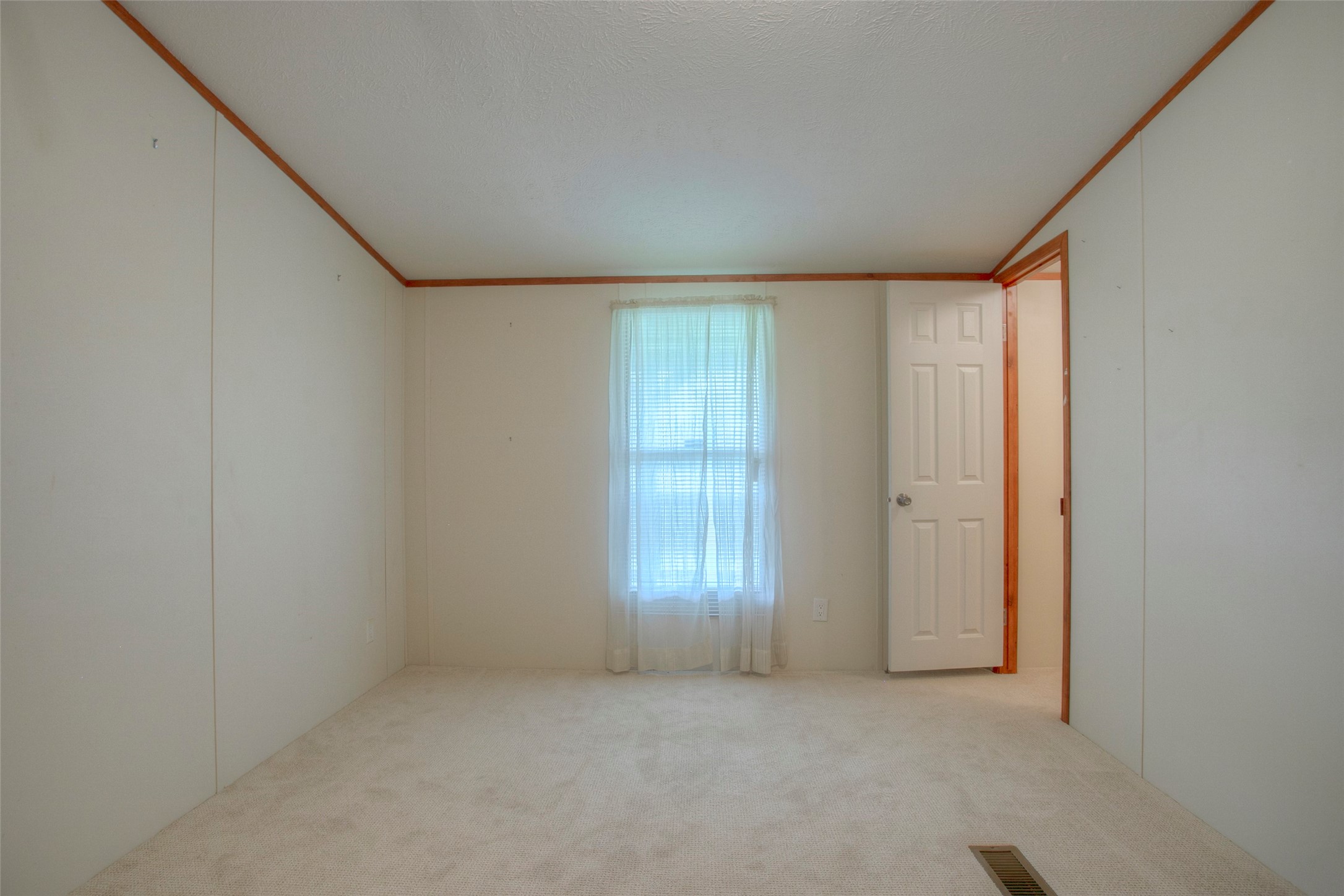 176 Low Keels Road Trinity, TX 75862 - Photo 35 of 46 an empty room with closet area