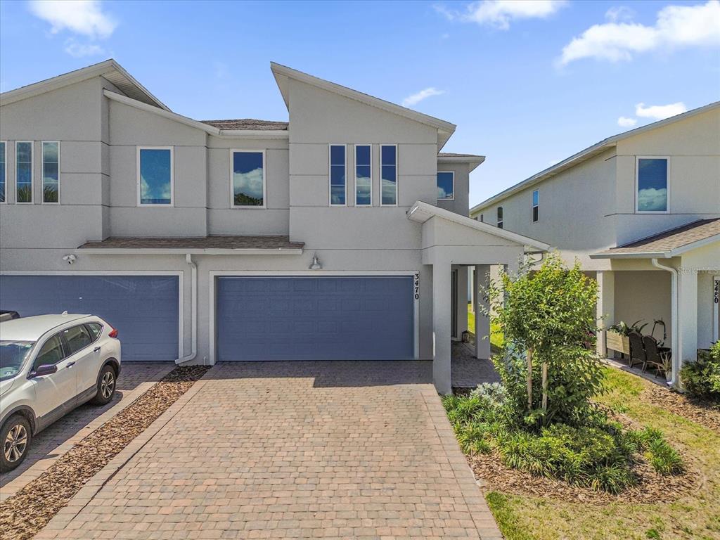 3470 Beau Road Kissimmee, FL 34746 - Photo 2 of 40 a house view with a backyard space