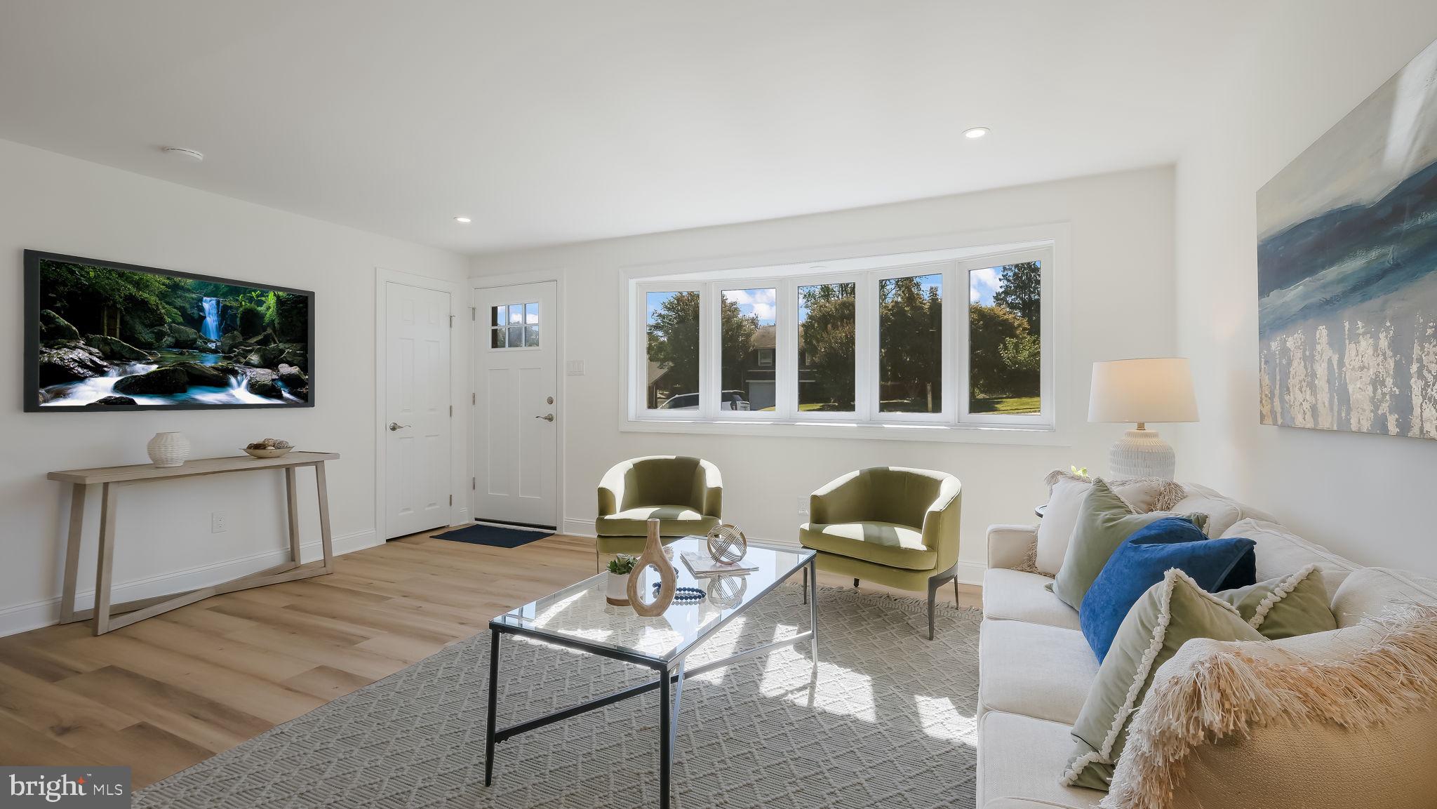 612 Cambridge Road Brookhaven, PA 19015 - Photo 11 of 57 New Luxury Vinyl Plank floors in living room