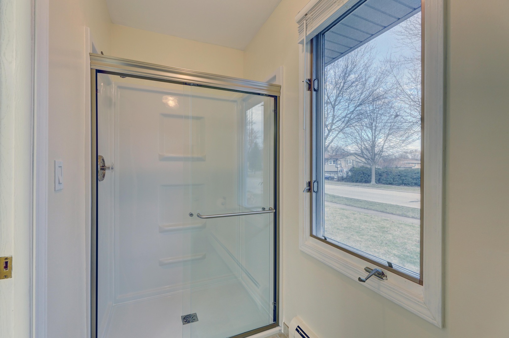 547 Eichler Drive West Dundee, IL 60118 - Photo 11 of 24 a bathroom with a glass shower door